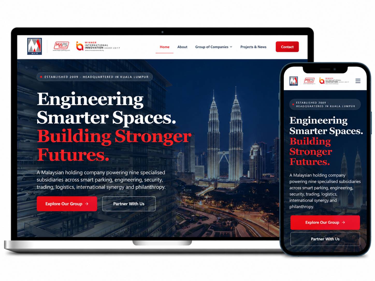 Laman web MA Group dipaparkan pada komputer riba dan telefon mudah alih dengan reka bentuk korporat yang responsif